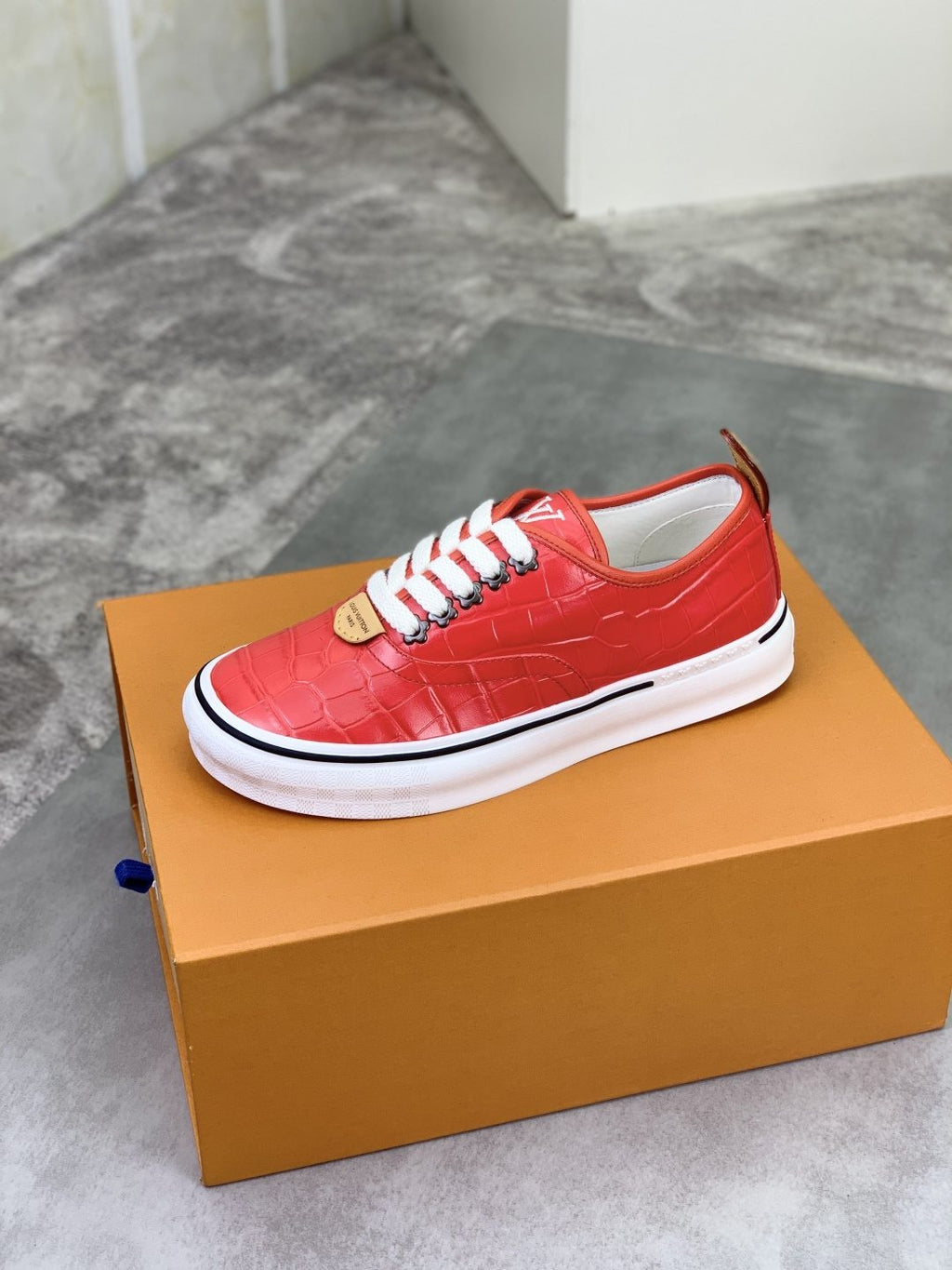 Louis Vuitton Red Embossed Low-Top Sneakers